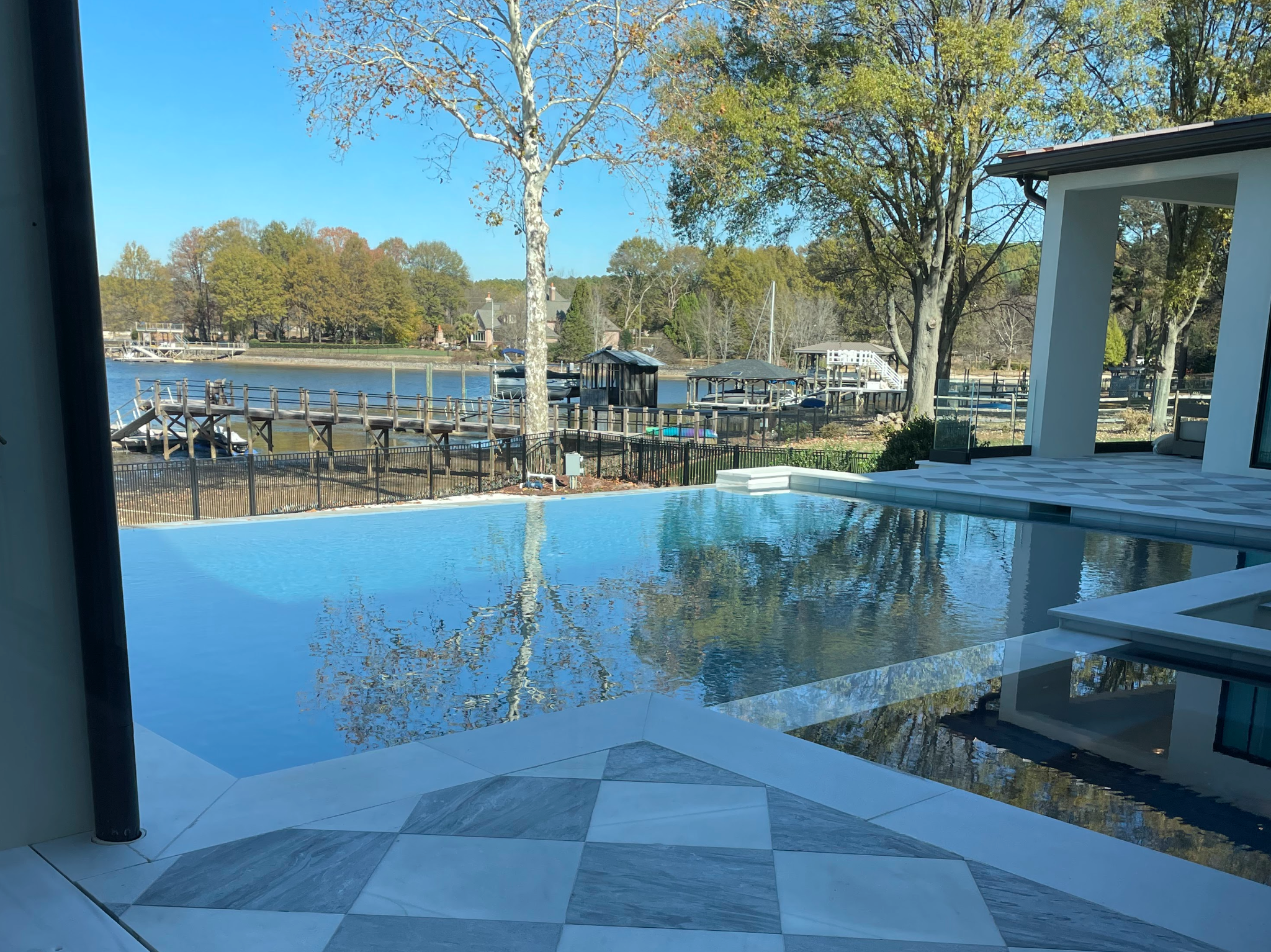 Luxury home with an infinity pool overlooking Lake Norman